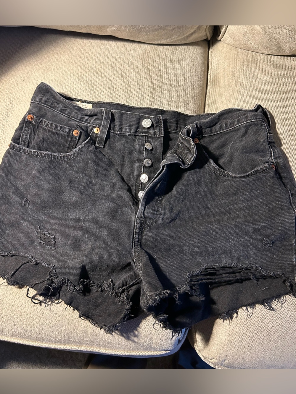 Levi’s cut off black jean shorts